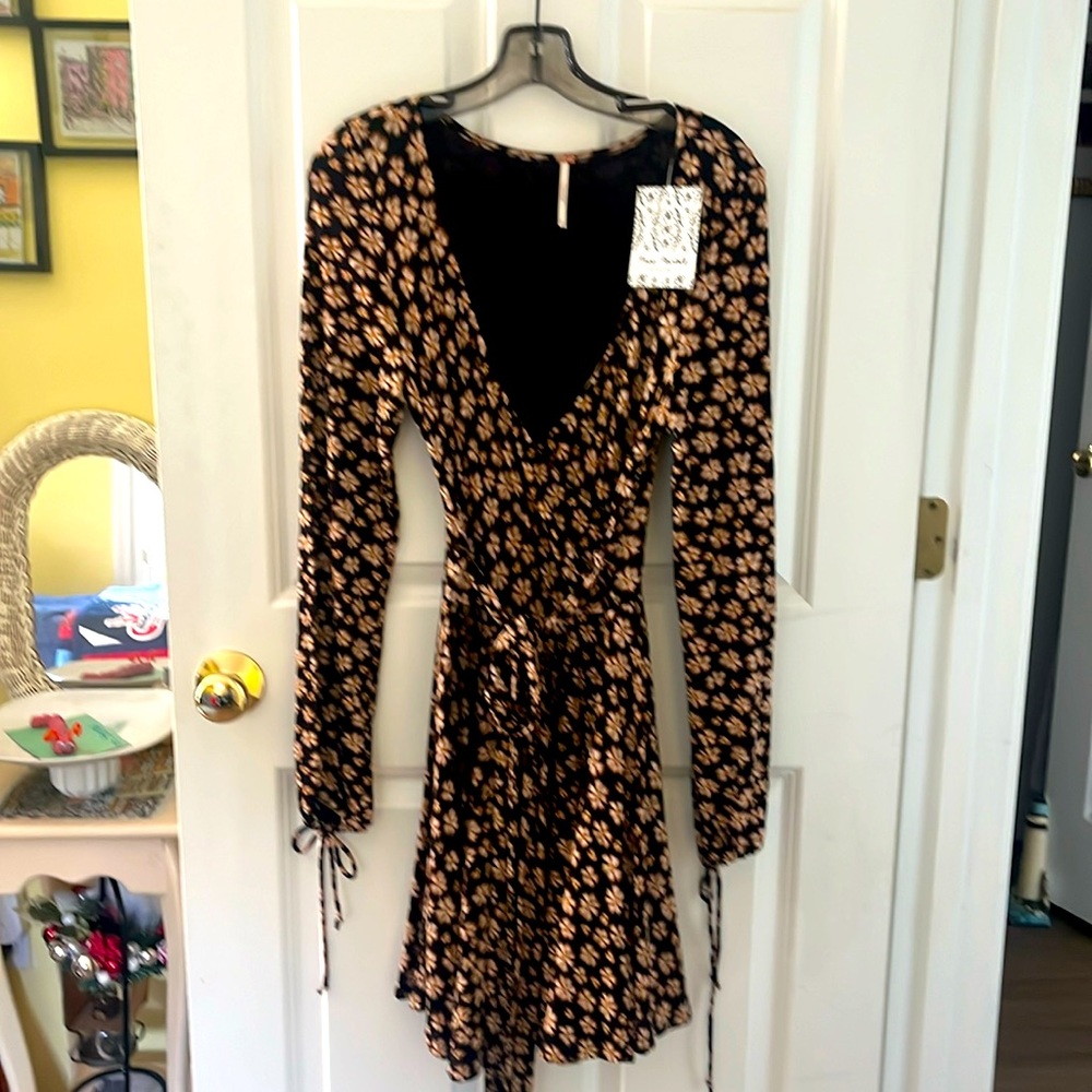 NWT! Women’s Super Stretchy Free People Faux Wrap Dress. Size XS but stretchy